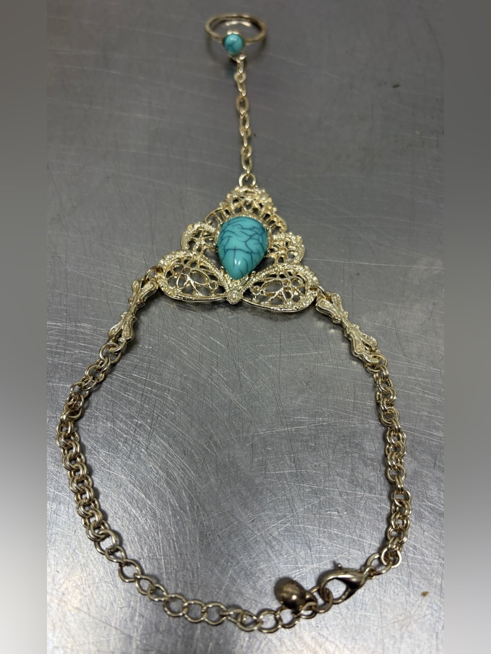 Gold Filigree Bracelet with Ring with Turquoise Teardrop Stone